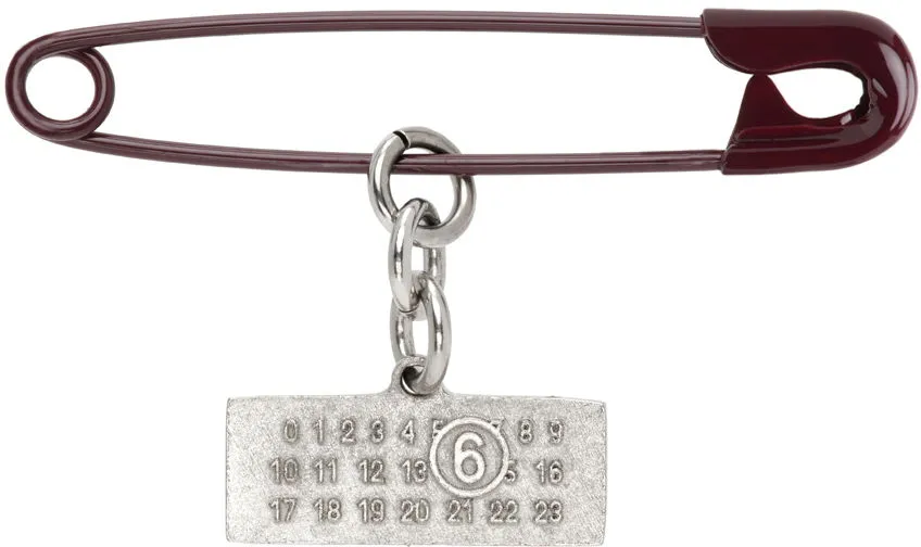 MAISON MARGIELA SAFETYPIN BROOCH WITH NUMBERS CHARM