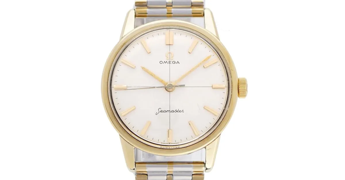 RELOJ OMEGA SEAMASTER CROSSLINE 143904SC DE CUERDA MANUAL PLATA DORADO 