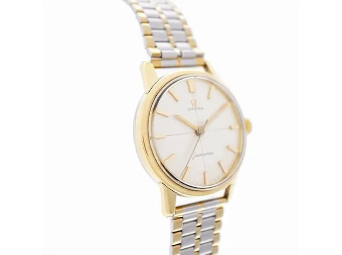 RELOJ OMEGA SEAMASTER CROSSLINE 143904SC DE CUERDA MANUAL PLATA DORADO 