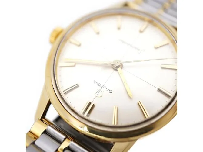 RELOJ OMEGA SEAMASTER CROSSLINE 143904SC DE CUERDA MANUAL PLATA DORADO 